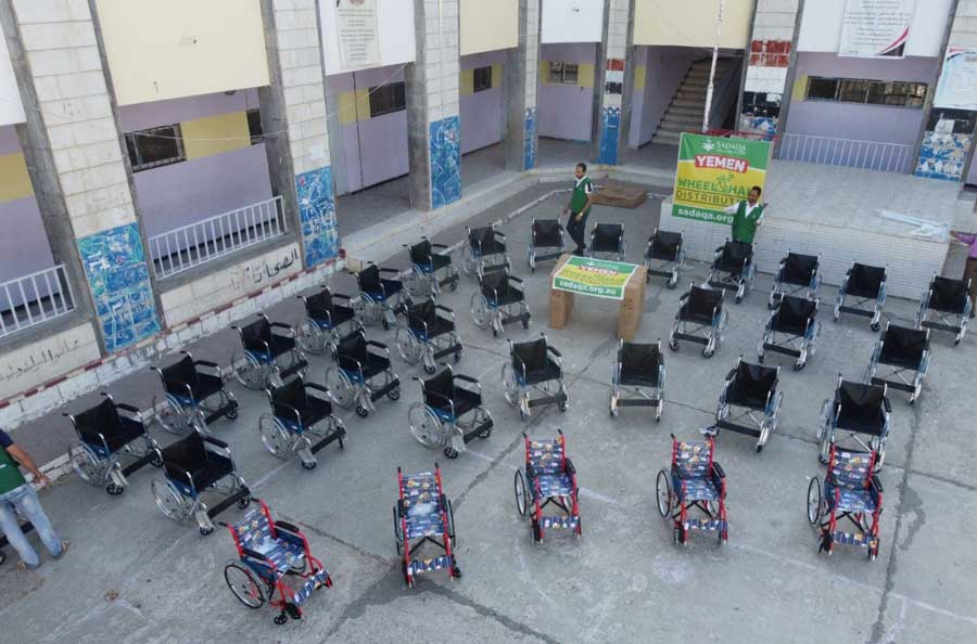 wheelchairs to 100 people with disabilities